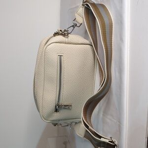 Cream faux leather crossbody bag with striped straps